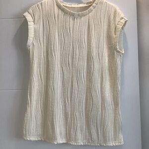 Cream coloured stretchy top